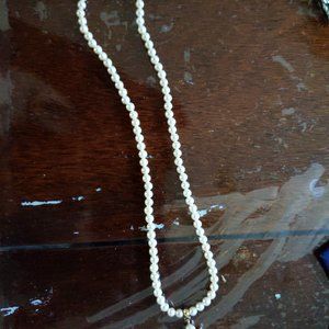 An elegant faux pearl necklace